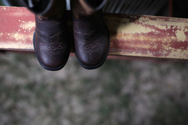 A pair of black cowboy boots