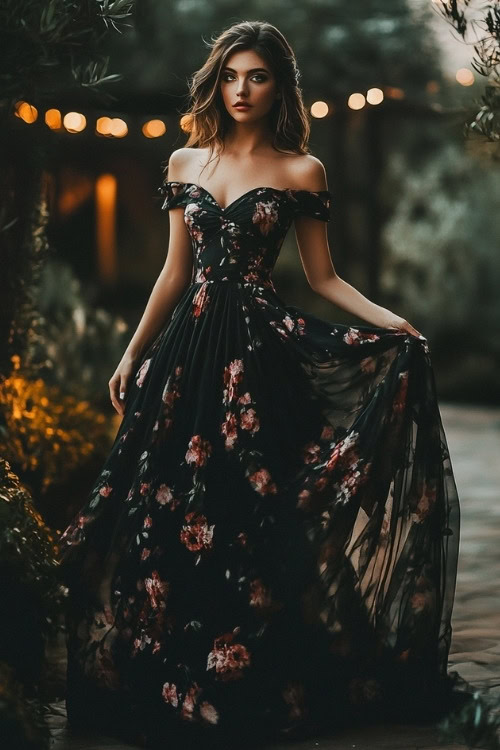 A woman wears an off shoulder black floral wedding guest dress with flowing skirt