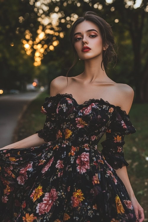 A woman wears an off shoulder black floral wedding guest dress