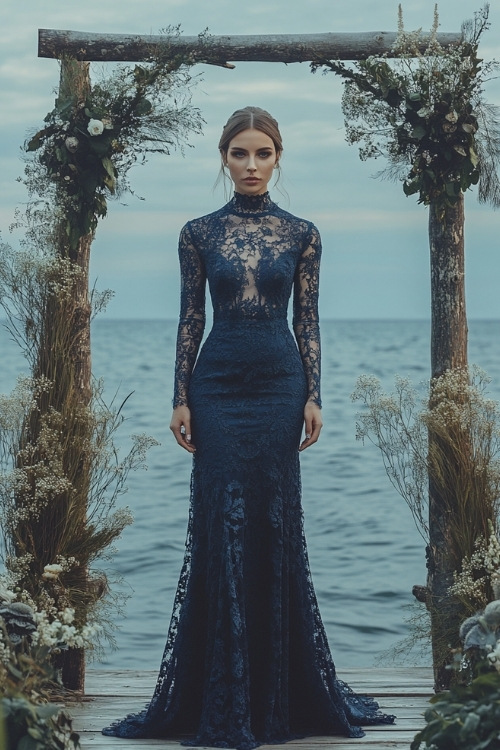 a woman wears a navy blue lace wedding guest dress with a mermaid silhouette