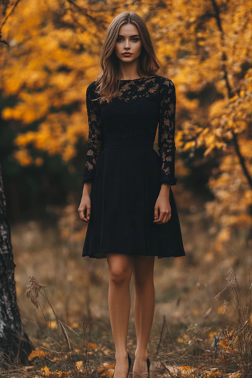 a woman wears a black wedding guest dress with lace sleeves