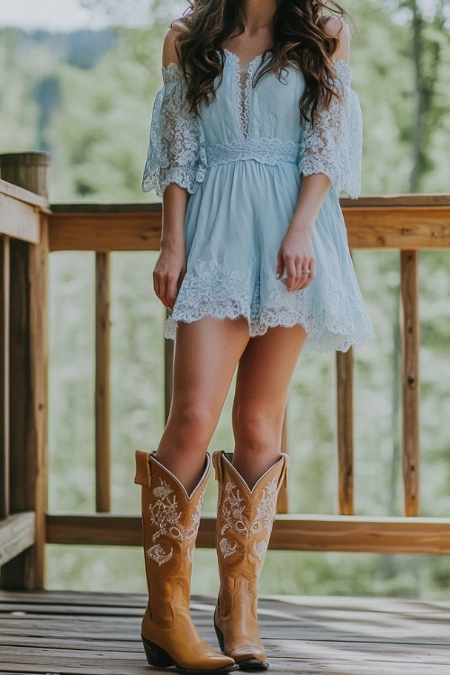 a woman wears a blue mini dress and tan cowboy boots