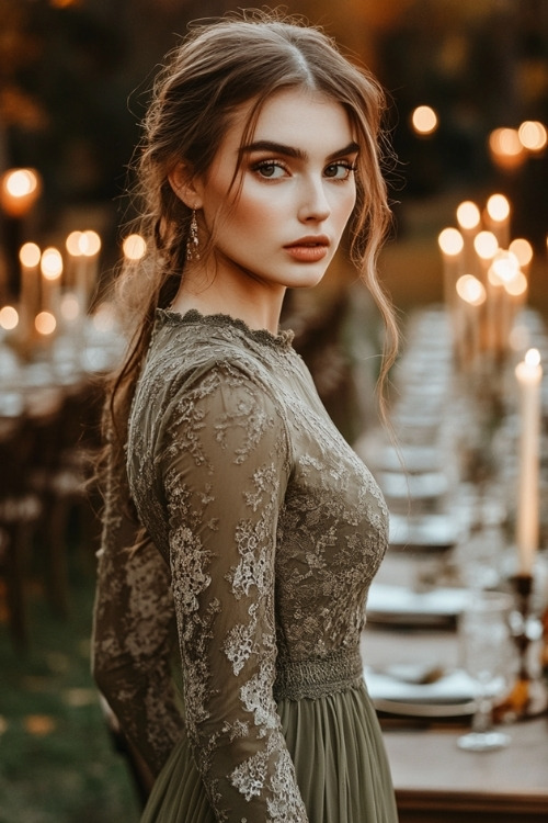 a woman wears an olive green wedding guest dress with long sleeves