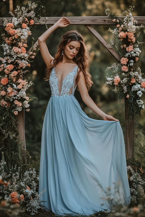 A woman wearing a light blue A-line dress with lace details and a flowy skirt, posing gracefully in a countryside wedding venue with a wooden arch decorated with flowers